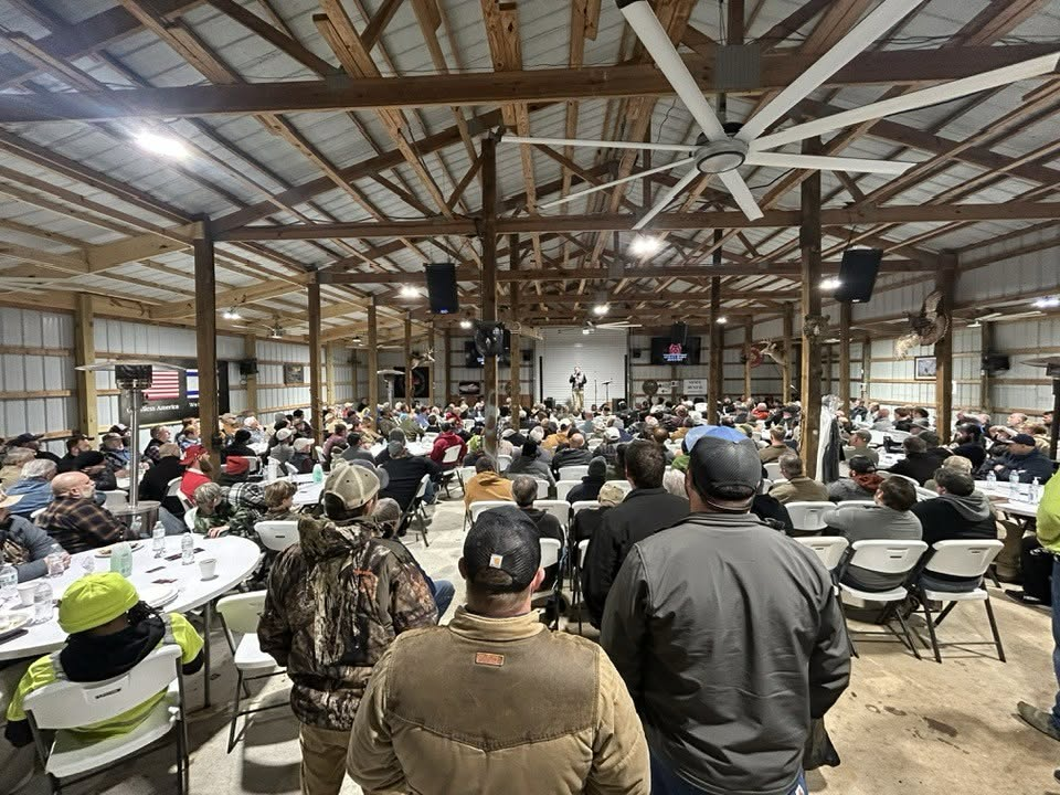 Full barn during a men's night gathering